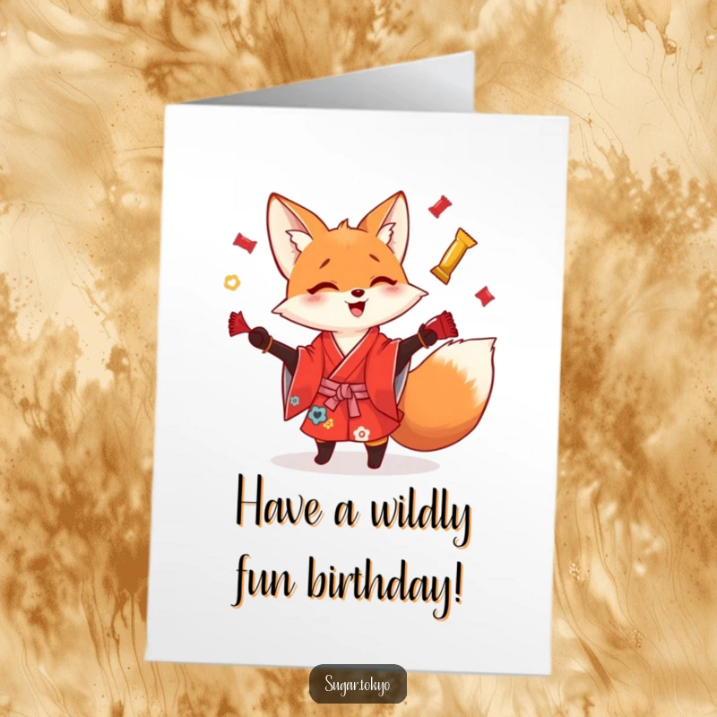 Funny Free Printable Birthday Card: Playful fox in red kimono juggles shiny candy wrappers, celebrating a wild birthday.