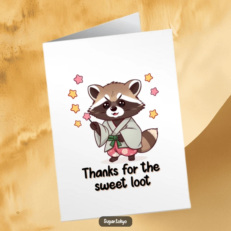 Funny Free Printable Thank You Card: A cool raccoon in a kimono expertly catches falling candy stars, sending sweet thanks.