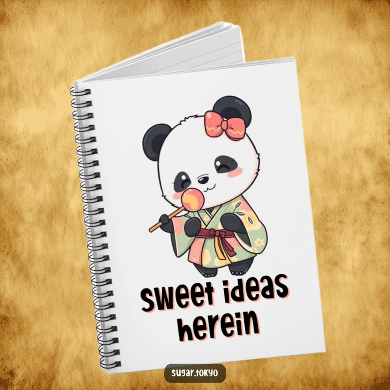 Funny notebook featuring a cute panda in a vibrant kimono happily holding a lollipop, perfect for sweet journaling and creative ideas.